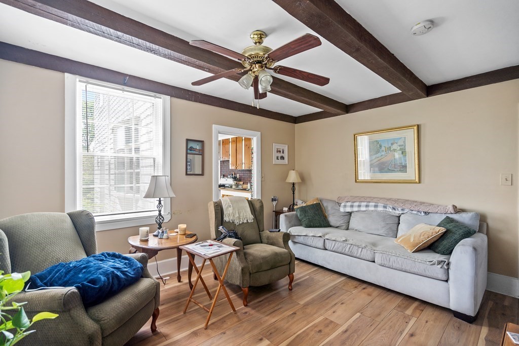 44 Stockbridge Road Scituate, MA 02066 - Photo 4 of 24 a living room with furniture and a large window