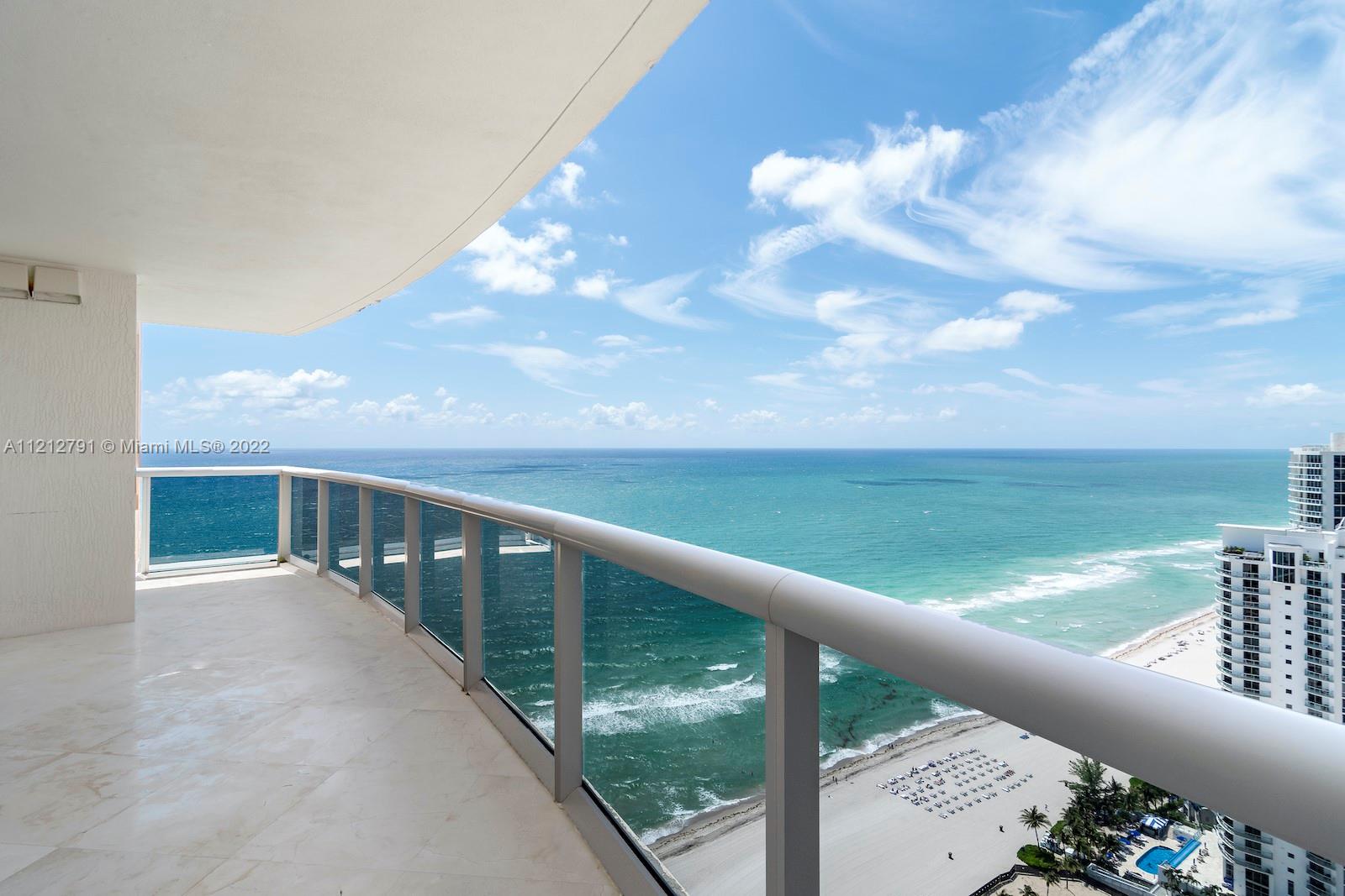 a view of balcony with ocean view