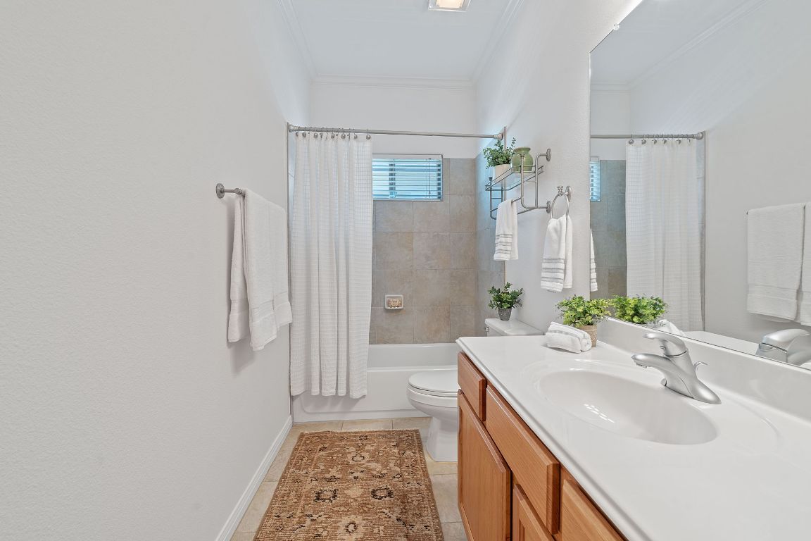 6801 Beckett Road, Unit 119R Austin, TX 78749 - Photo 20 of 26 a bathroom with a sink a vanity and a mirror
