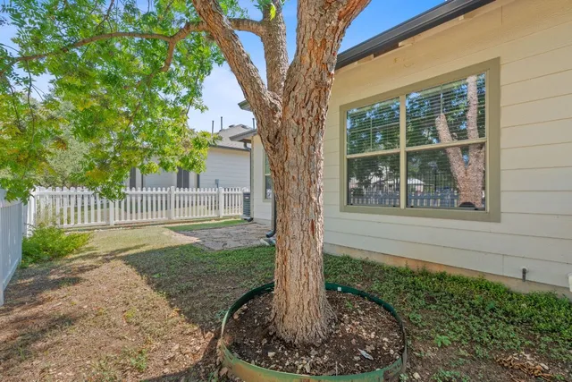 a house view with a garden space