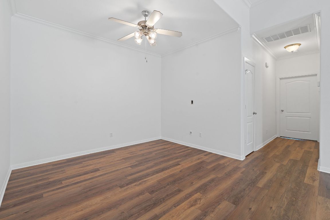 6801 Beckett Road, Unit 119R Austin, TX 78749 - Photo 7 of 26 wooden floor in an empty room