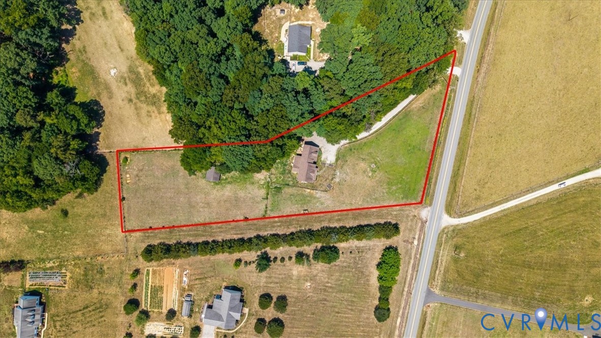 3137 Trenholm Road Powhatan, VA 23139 - Photo 6 of 72 a front view of a house with a yard