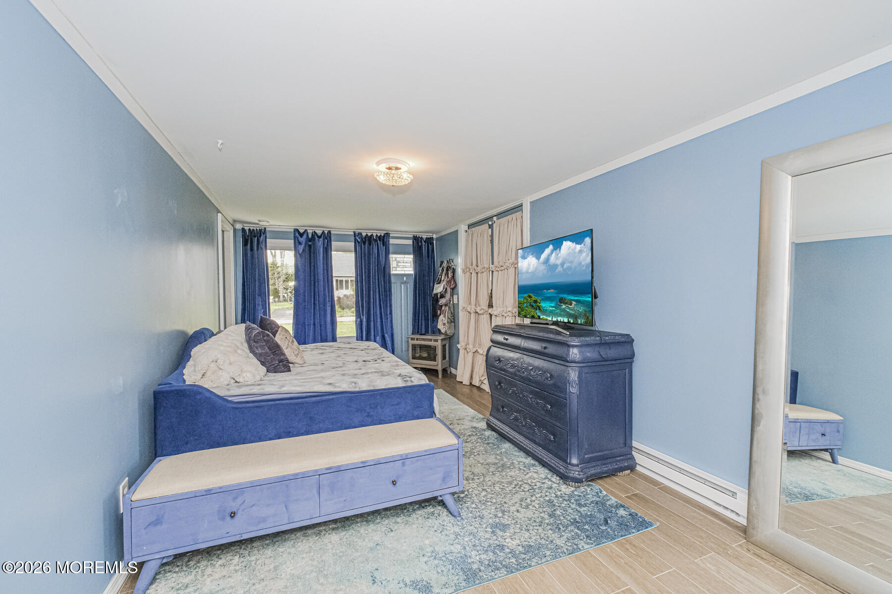 5 Riccis Drive Jackson, NJ 08527 - Photo 17 of 32 a living room with furniture and a flat screen tv
