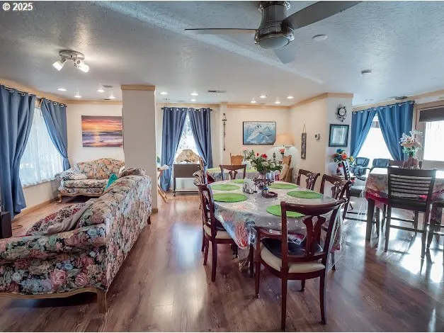 a kitchen with granite countertop cabinets sink and stove