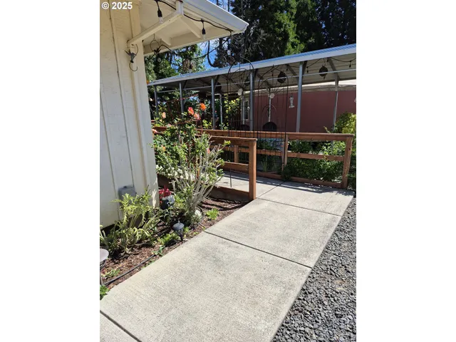 a kitchen with a sink and a refrigerator