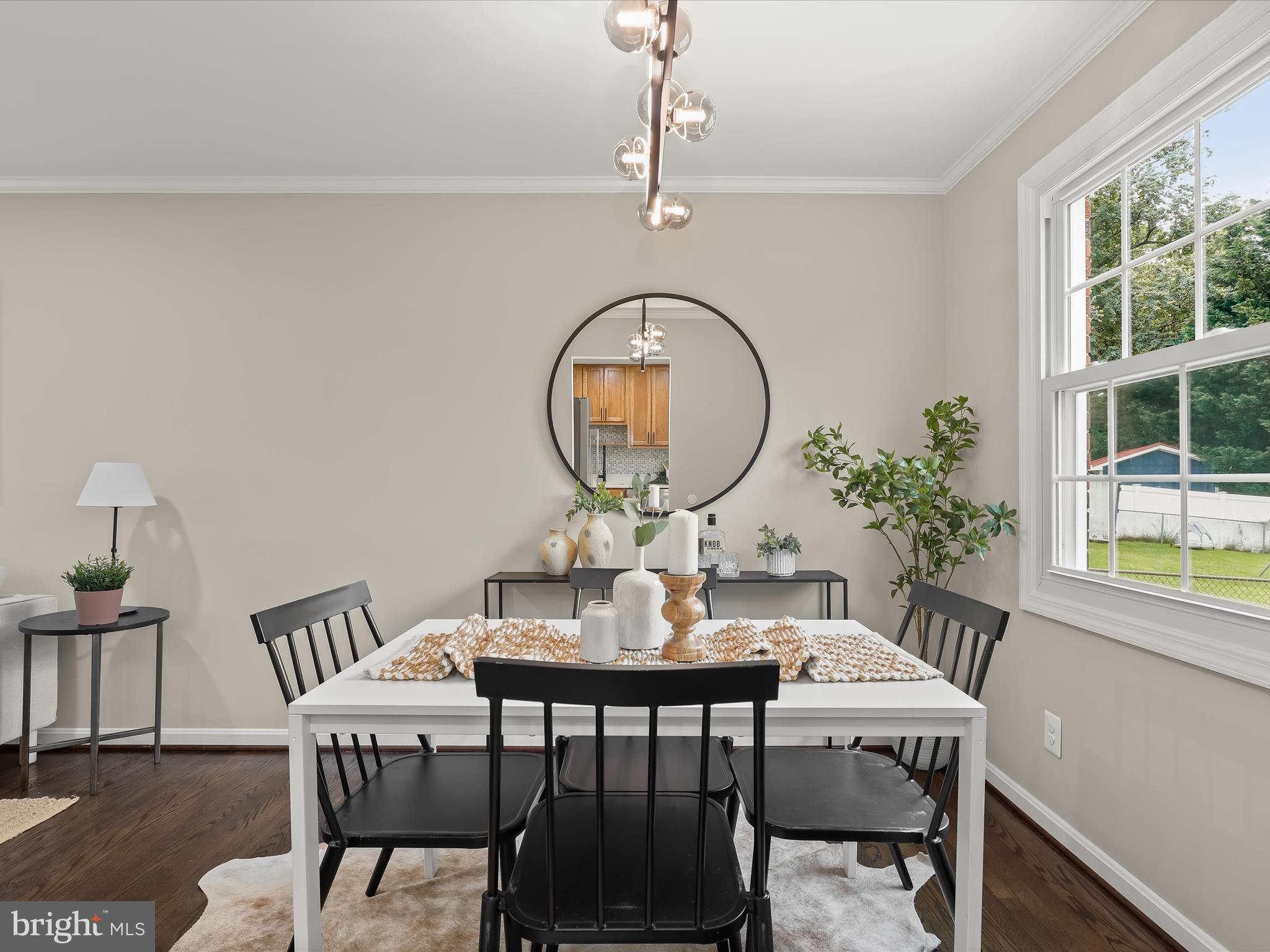 13214 Holdridge Road Silver Spring, MD 20906 - Photo 3 of 33 a view of a dining room with furniture window and wooden floor