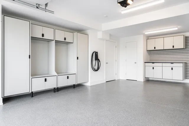 a view of an empty room with closet