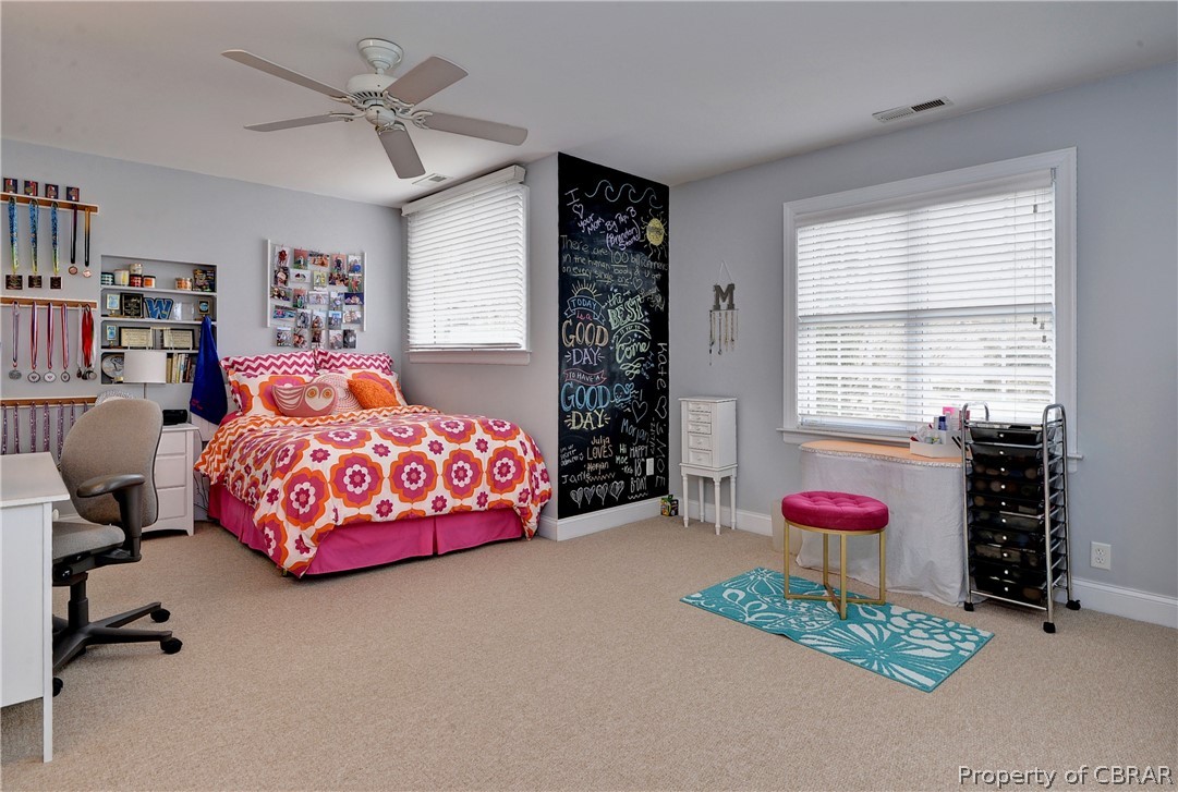 3165 Ridge Drive Toano, VA 23168 - Photo 26 of 41 Bedroom two includes a large walk-in closet.