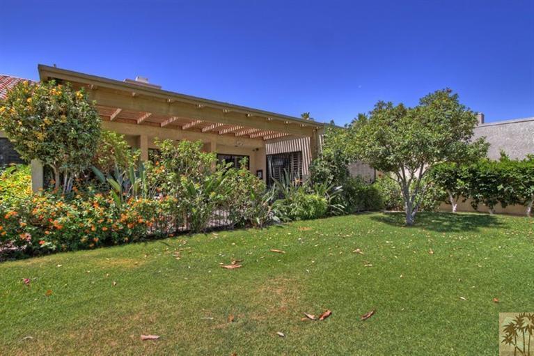 925 Inverness Drive Rancho Mirage, CA 92270 - Photo 26 of 35 a view of a large garden with plants and large trees