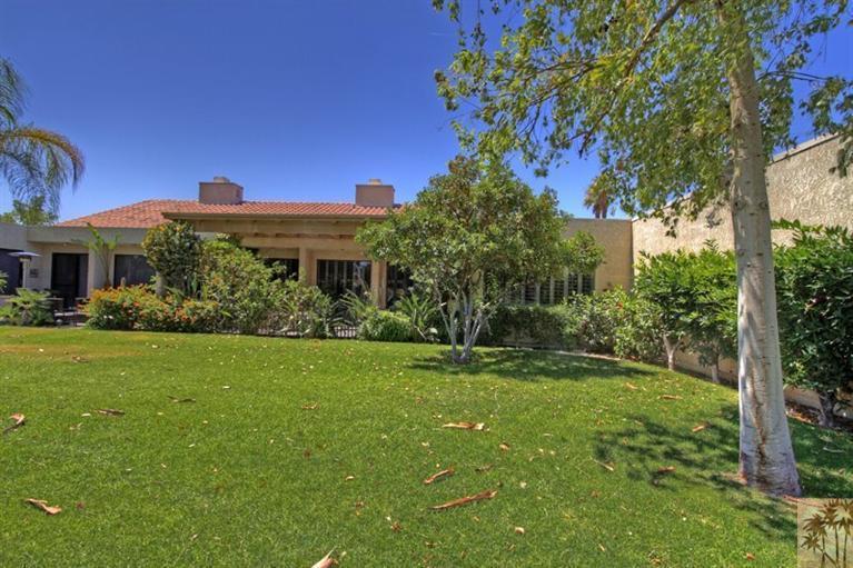 925 Inverness Drive Rancho Mirage, CA 92270 - Photo 30 of 35 a front view of a house with a yard