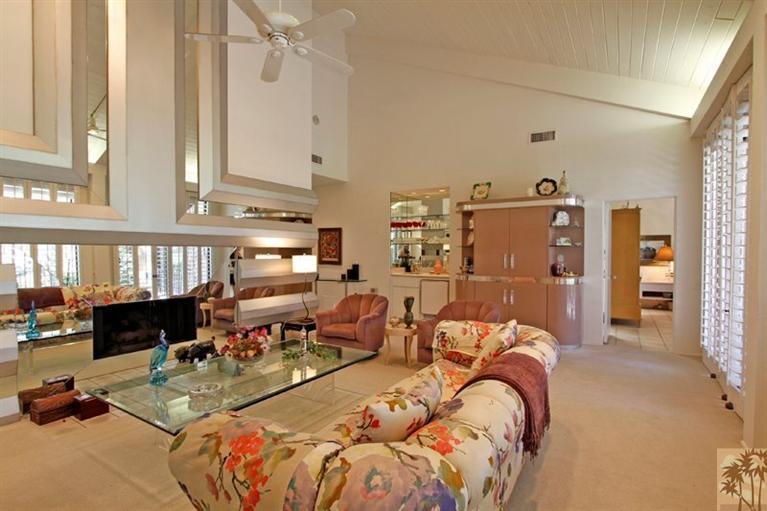 925 Inverness Drive Rancho Mirage, CA 92270 - Photo 3 of 35 a bed room with bed and a large mirror