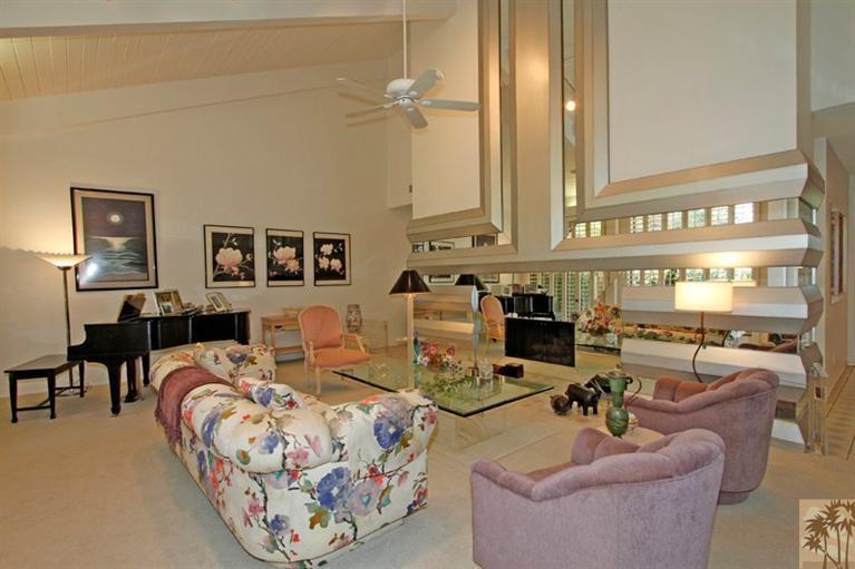 925 Inverness Drive Rancho Mirage, CA 92270 - Photo 4 of 35 a living room with furniture and a large window