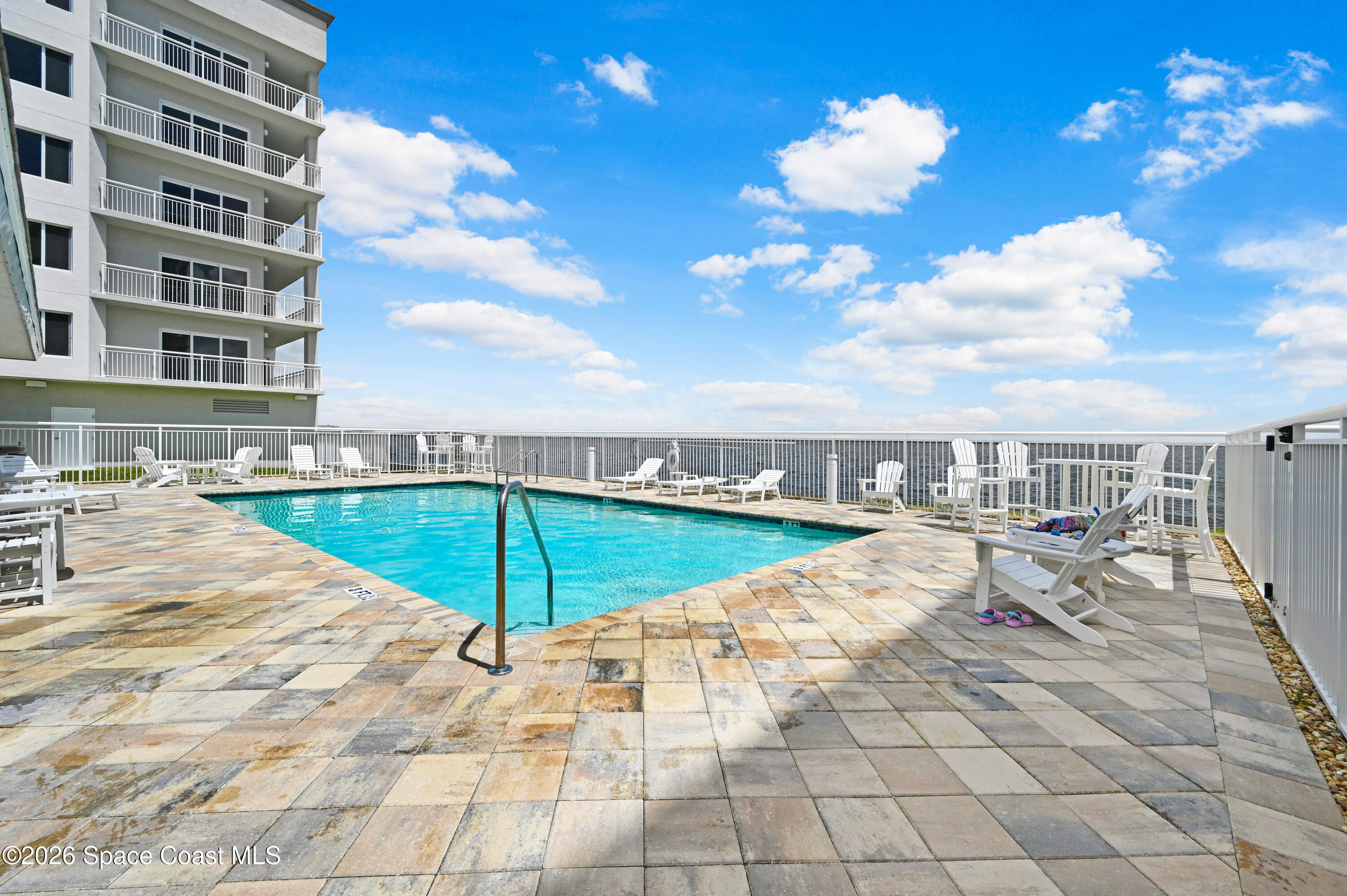 1805 Riverside Drive, Unit 304 Titusville, FL 32780 - Photo 43 of 46 a view of a terrace with an outdoor seating