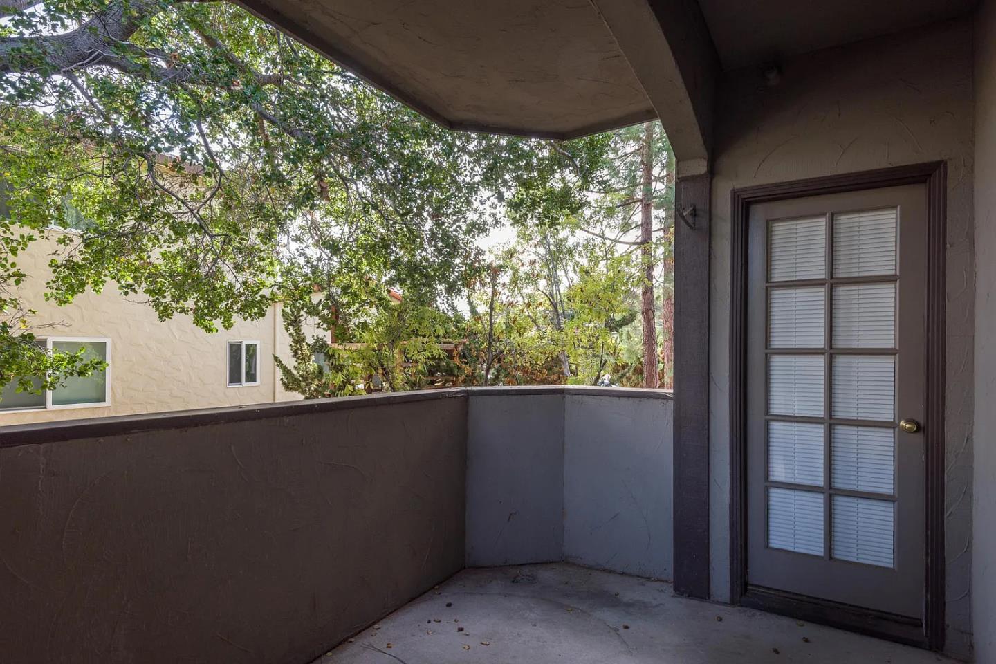 112 Madison Avenue, Unit 108 San Mateo, CA 94402 - Photo 13 of 17 a view of a house with a tree