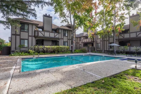 a view of a house with a swimming pool