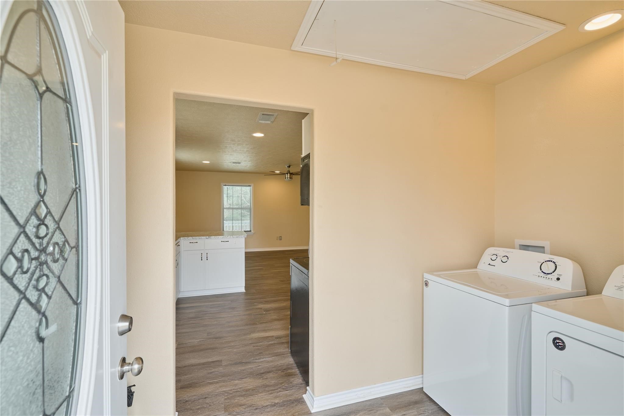 450 Ritchey Road Coldspring, TX 77331 - Photo 25 of 27 a view of hallway with wooden floor