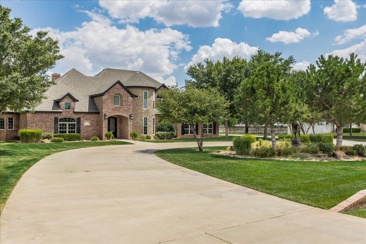 17701 White Wing Road Canyon, TX 79015 - Photo 2 of 76 a front view of a house with a yard