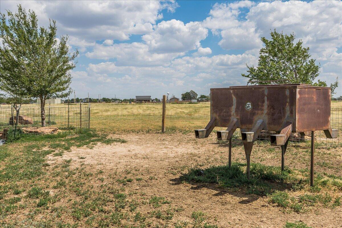 17701 White Wing Road Canyon, TX 79015 - Photo 63 of 76 a view of a yard with an outdoor space