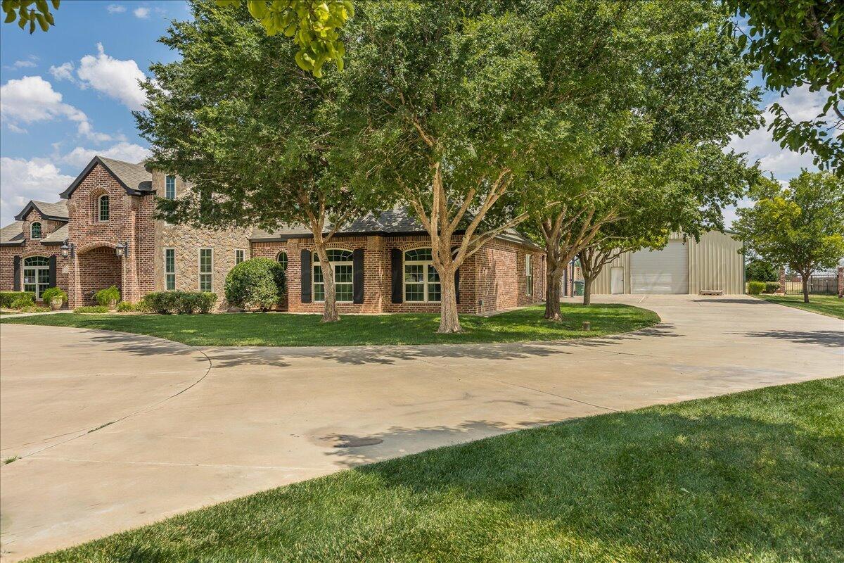 17701 White Wing Road Canyon, TX 79015 - Photo 65 of 76 front view of a house with a yard