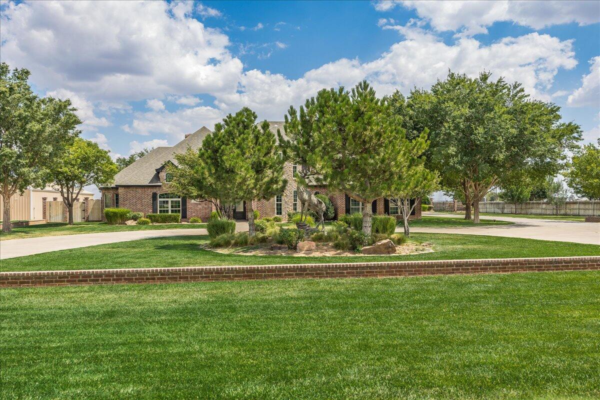 17701 White Wing Road Canyon, TX 79015 - Photo 66 of 76 a front view of a house with a yard