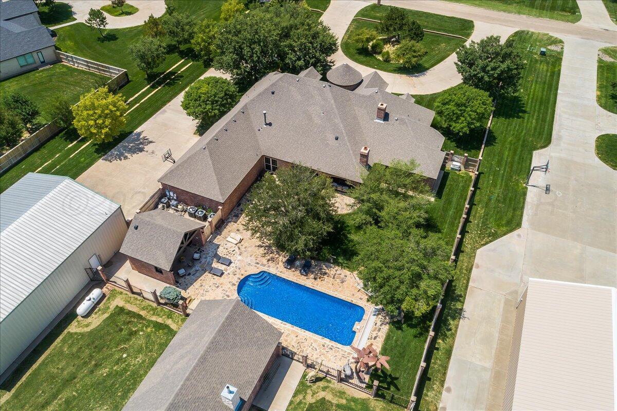 17701 White Wing Road Canyon, TX 79015 - Photo 70 of 76 an aerial view of a house with a yard