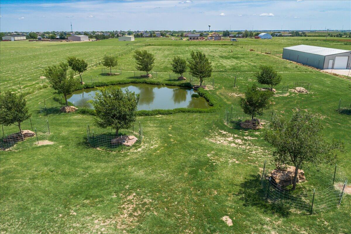 17701 White Wing Road Canyon, TX 79015 - Photo 72 of 76 a view of a lake with houses with outdoor space