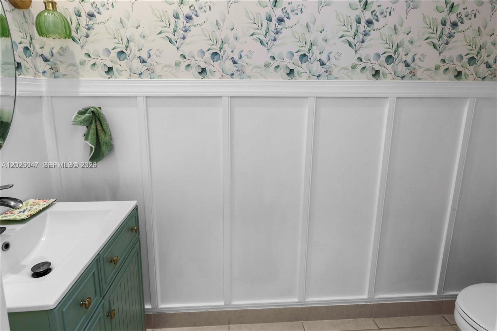 12862 Southwest 231st Street Miami, FL 33170 - Photo 16 of 30 a bathroom with a sink and a toilet