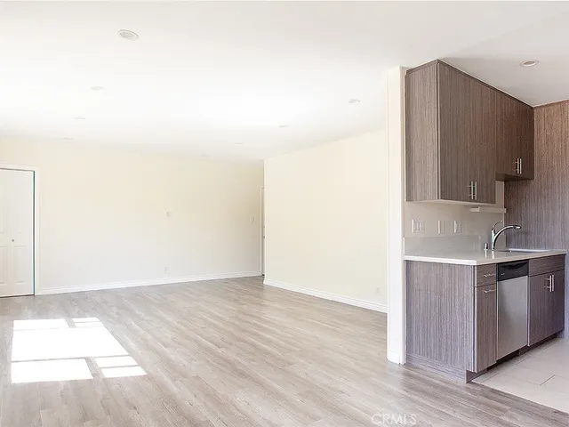 a view of a kitchen from the hallway