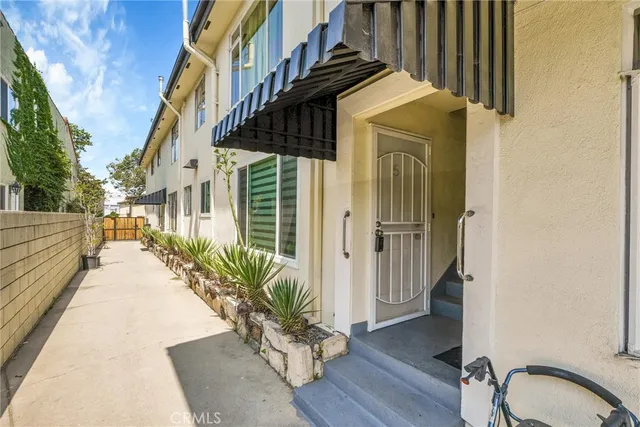 a view of a house with a street