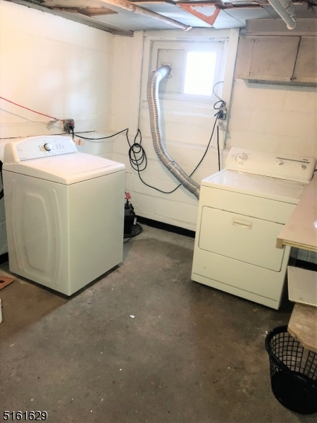 209 Hillside Avenue, Unit 2 Glen Ridge, NJ 07028 - Photo 17 of 17 a utility room with dryer and washer