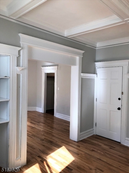 209 Hillside Avenue, Unit 2 Glen Ridge, NJ 07028 - Photo 6 of 17 a view of a hallway with wooden floor