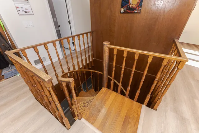 a bedroom with a bed and a view of bathroom