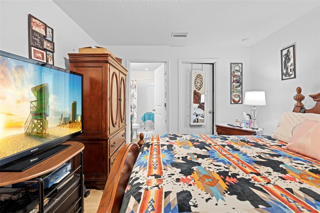 26448 Bertram Road Brooksville, FL 34602 - Photo 24 of 31 a bedroom with natural light