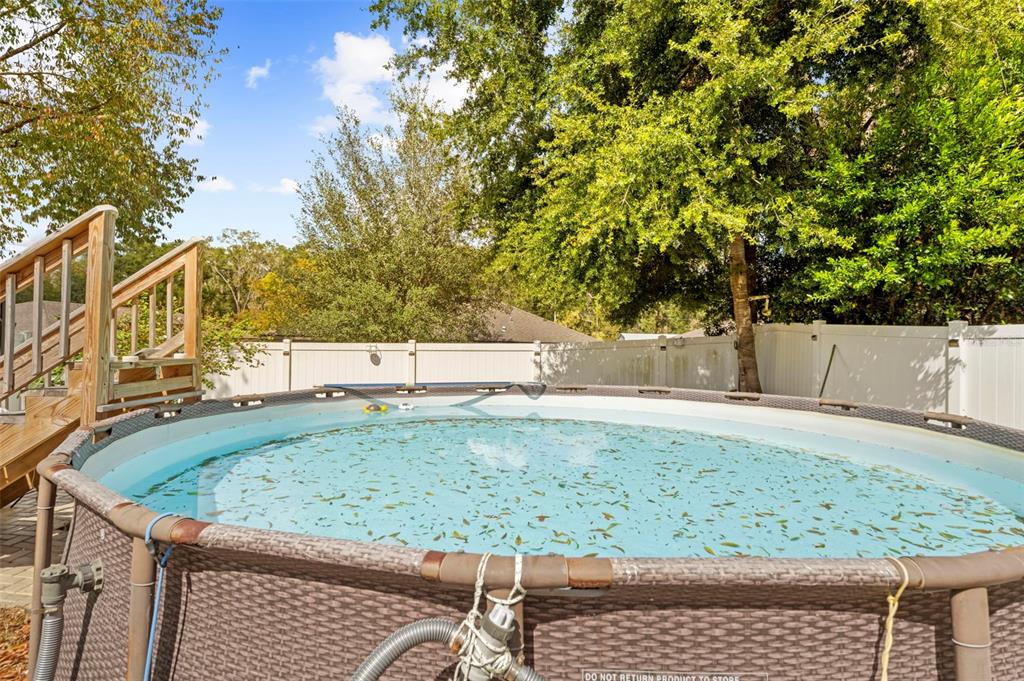 26448 Bertram Road Brooksville, FL 34602 - Photo 31 of 31 a view of a backyard