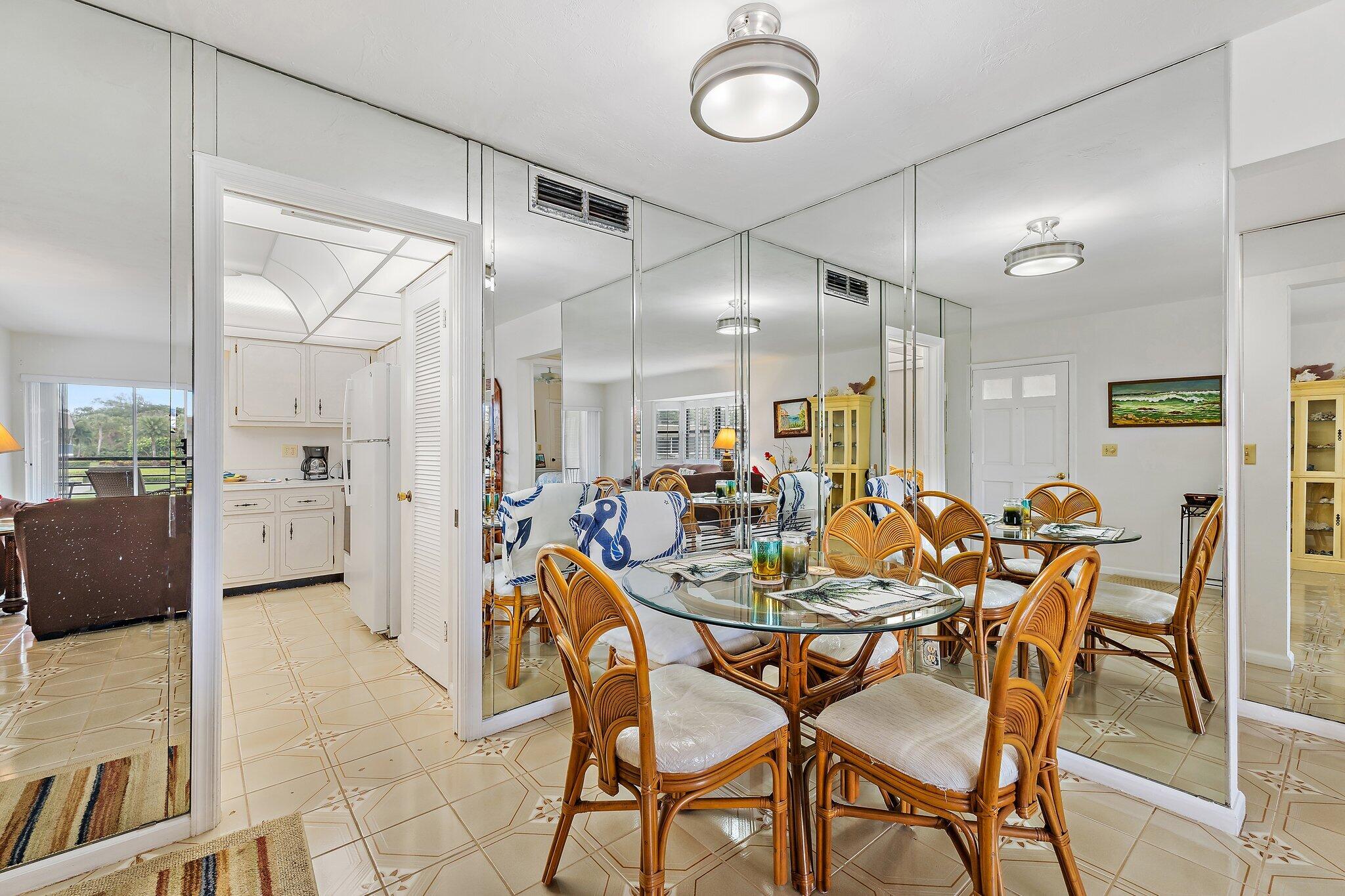 755 Saturn Street, Unit D 201 Jupiter, FL 33477 - Photo 22 of 42 a view of a dining room and livingroom view