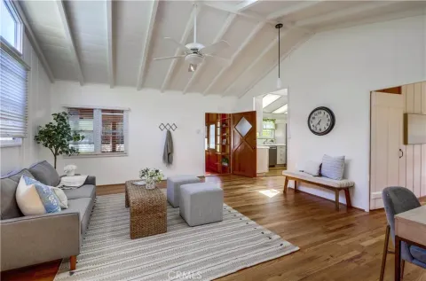 a bathroom with a granite countertop shower and a sink