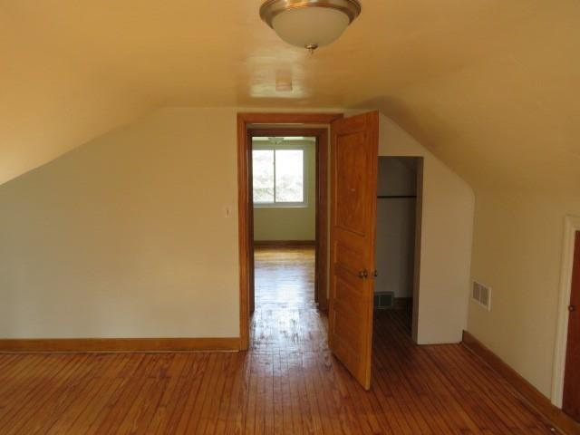 80 Woods Road Pittsburgh, PA 15235 - Photo 13 of 21 a view of a hallway with wooden floor