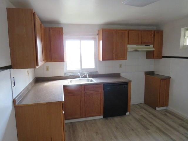 80 Woods Road Pittsburgh, PA 15235 - Photo 6 of 21 a kitchen with kitchen island granite countertop wooden cabinets a sink and dishwasher