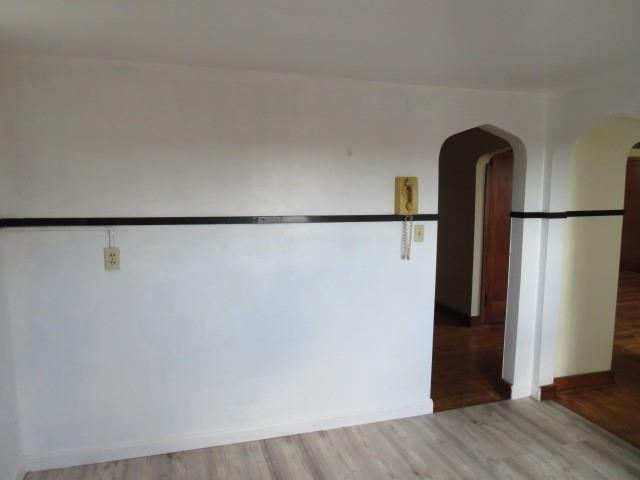80 Woods Road Pittsburgh, PA 15235 - Photo 8 of 21 a view of a refrigerator in kitchen and an empty room