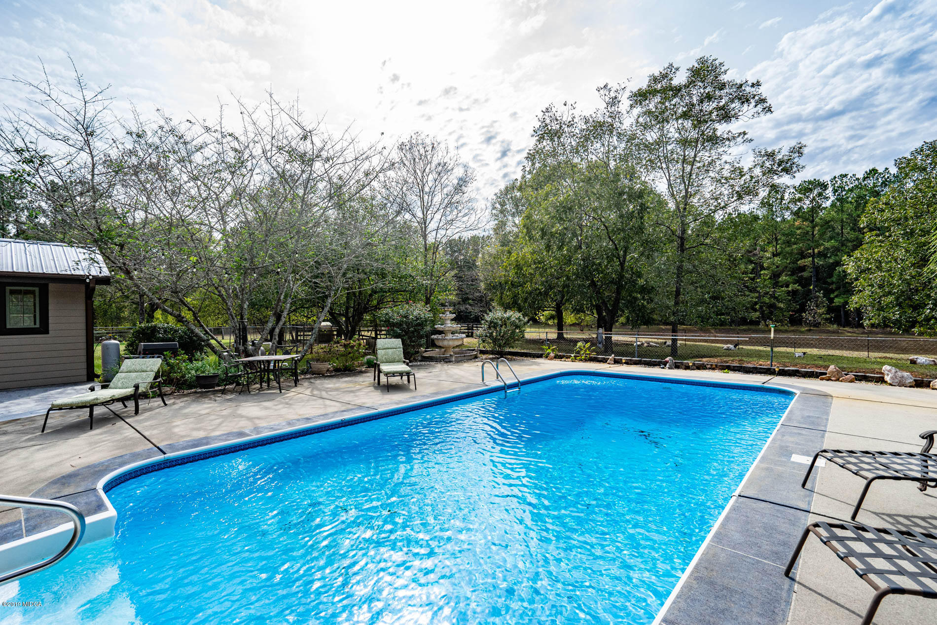 2064 Midway Road Lizella, GA 31052 - Photo 11 of 40 a view of swimming pool with chairs