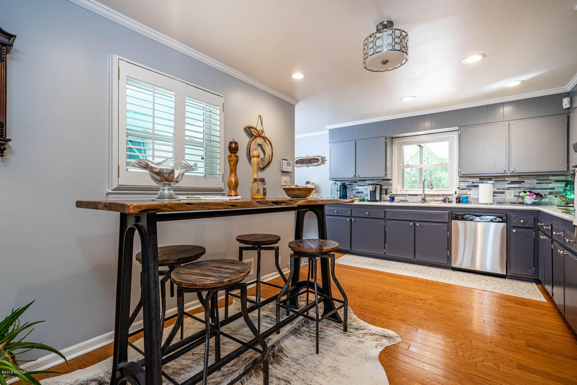 2064 Midway Road Lizella, GA 31052 - Photo 18 of 40 a kitchen with a table and chairs in it