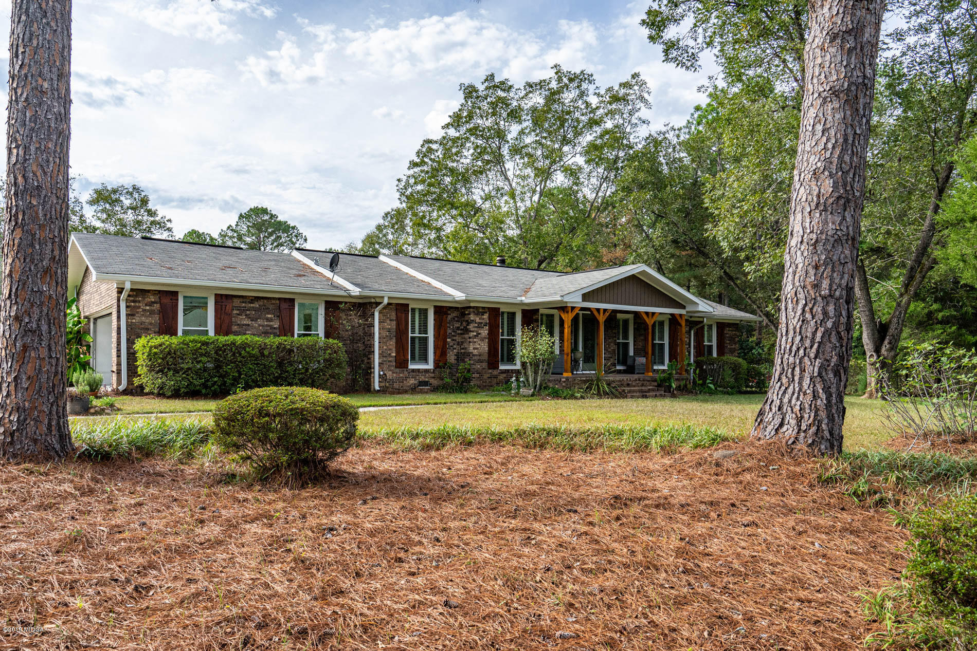 2064 Midway Road Lizella, GA 31052 - Photo 37 of 40 a front view of a house with a yard