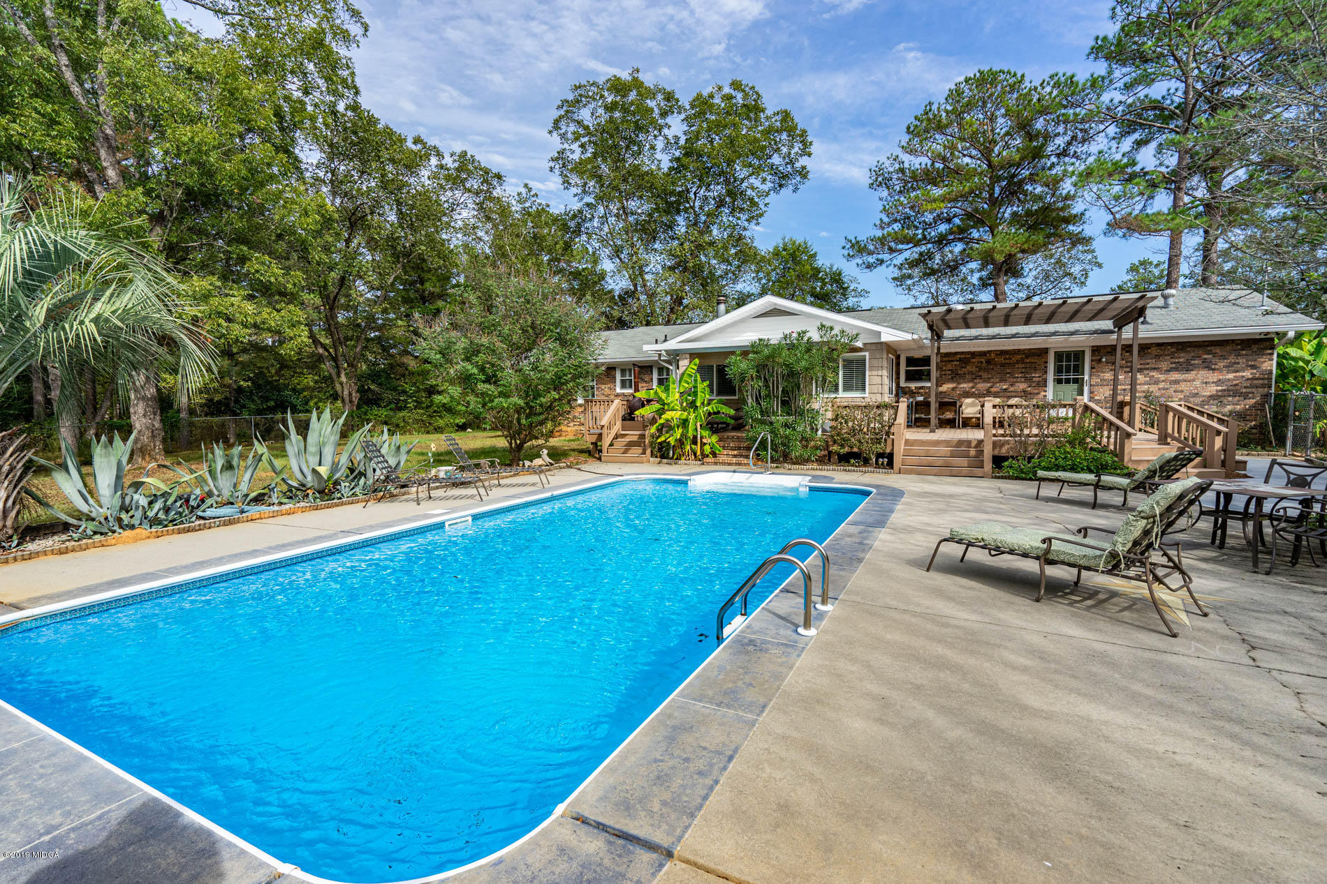 2064 Midway Road Lizella, GA 31052 - Photo 40 of 40 a view of swimming pool with chairs
