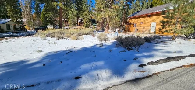a view of snow on the road