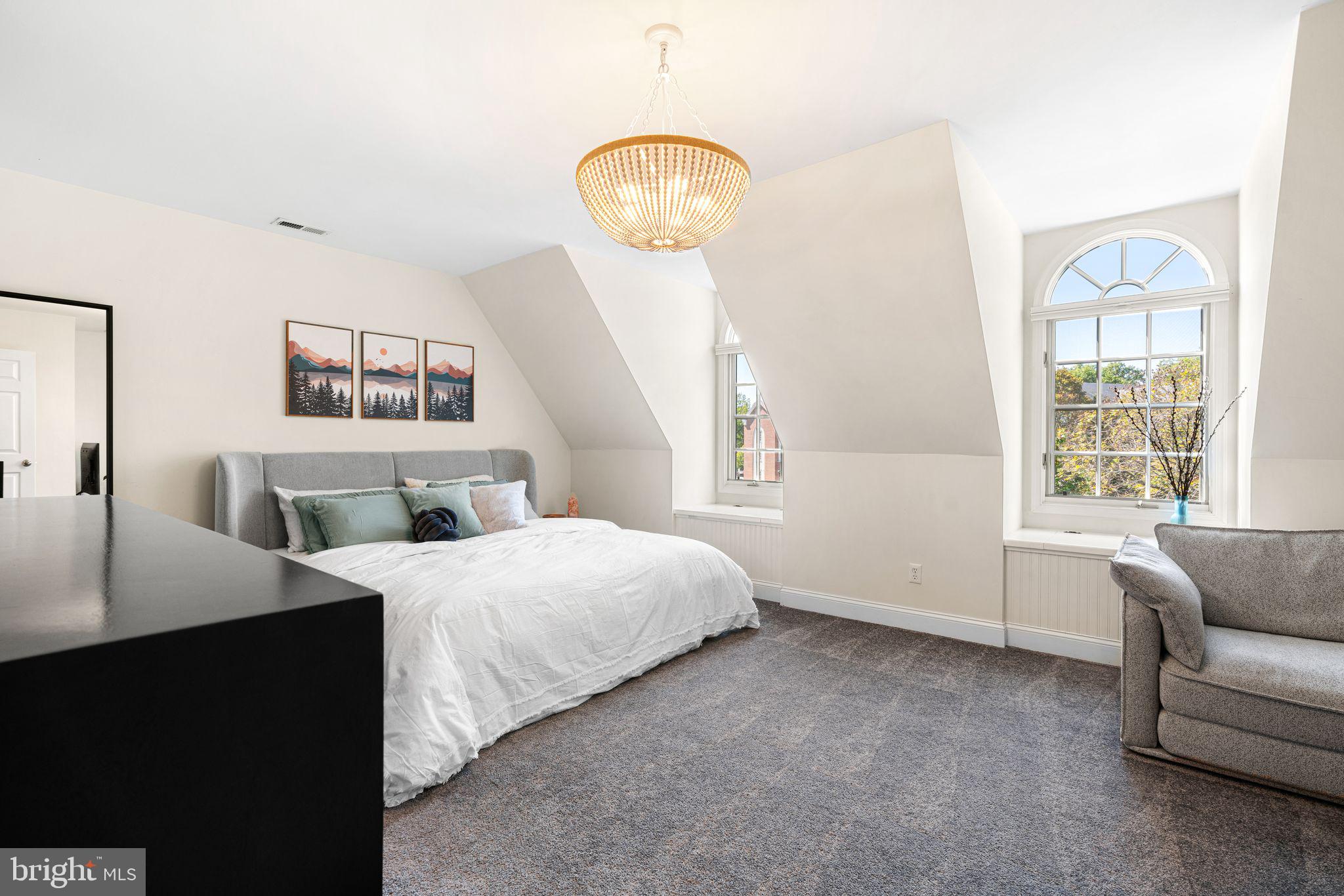 10 Washington Avenue Haddonfield, NJ 08033 - Photo 17 of 35 a bedroom with a bed and a chandelier