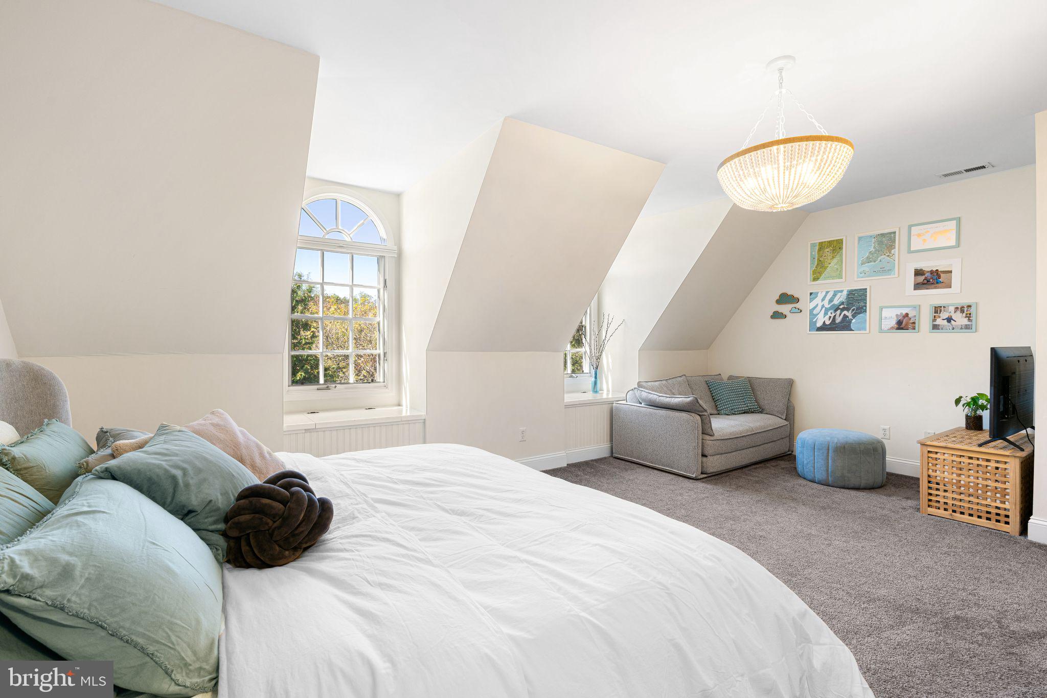 10 Washington Avenue Haddonfield, NJ 08033 - Photo 19 of 35 a bedroom with a bed and a window
