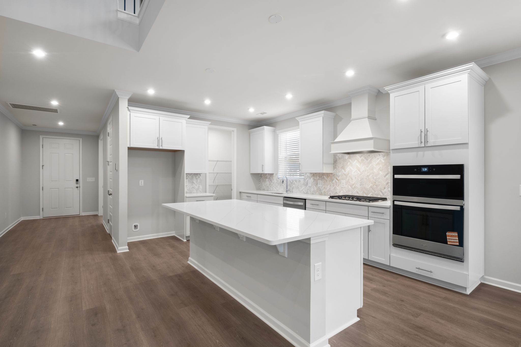 507 Pine Valley Rd Mount Mount Juliet, TN 37122 - Photo 7 of 48 a kitchen with a sink stainless steel appliances and white cabinets