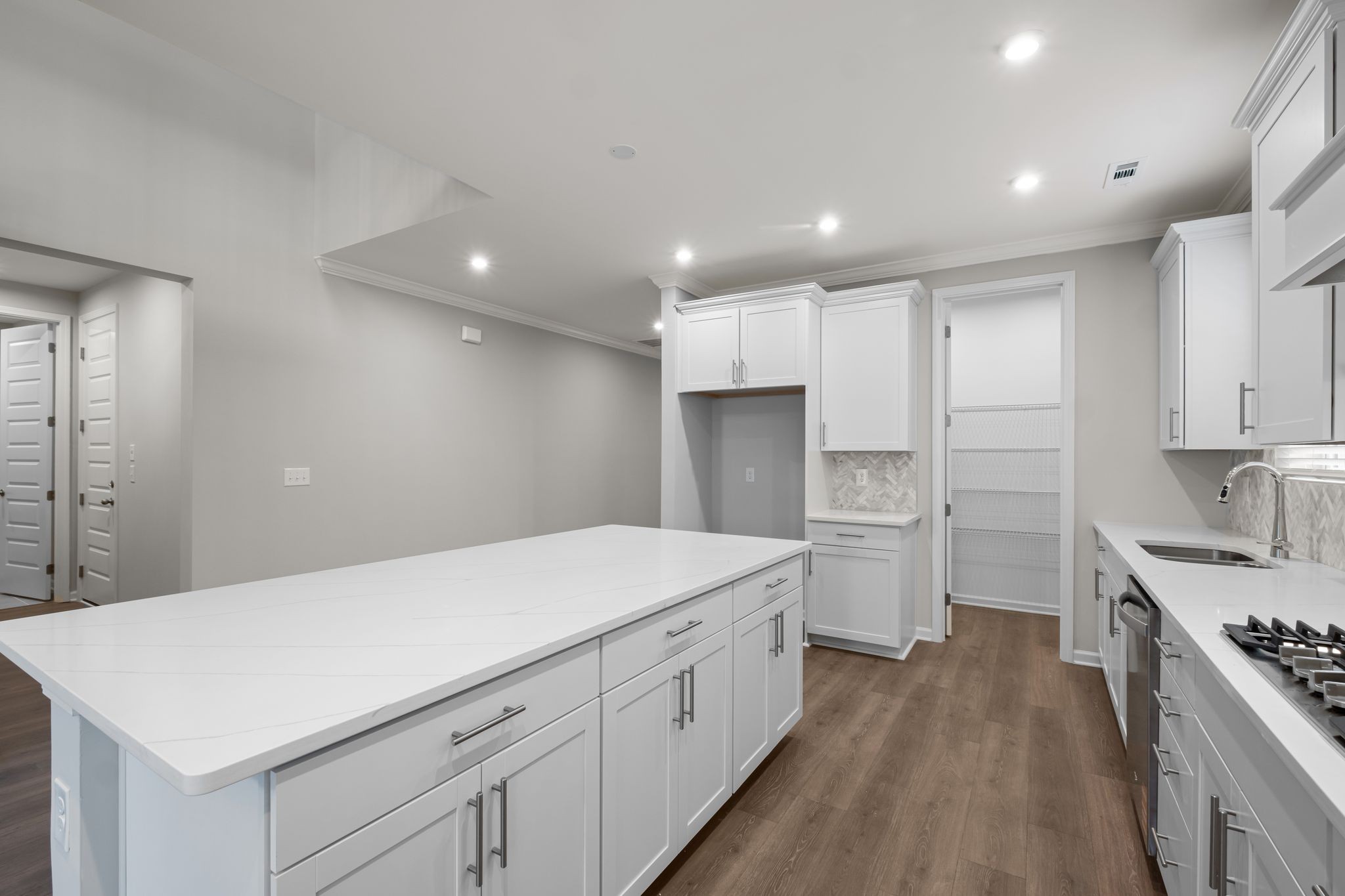 507 Pine Valley Rd Mount Mount Juliet, TN 37122 - Photo 8 of 48 a kitchen with white cabinets and stainless steel appliances