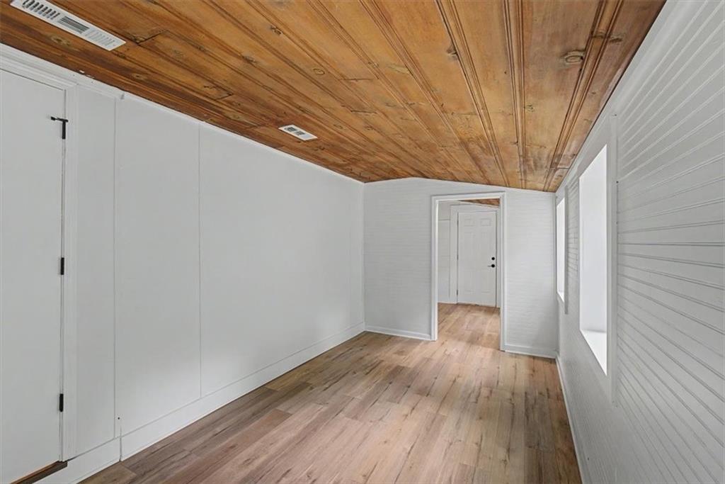 2115 King Road Dalton, GA 30720 - Photo 24 of 54 a big room with wooden floor and closet