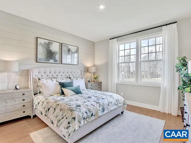 1906 Flora Court Charlottesville, VA 22911 - Photo 11 of 16 a bedroom with a large bed and a window
